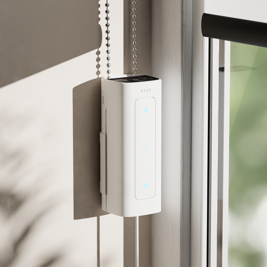 RYSE SmartShade retrofit motor mounted on the beaded chain of an existing roller shade